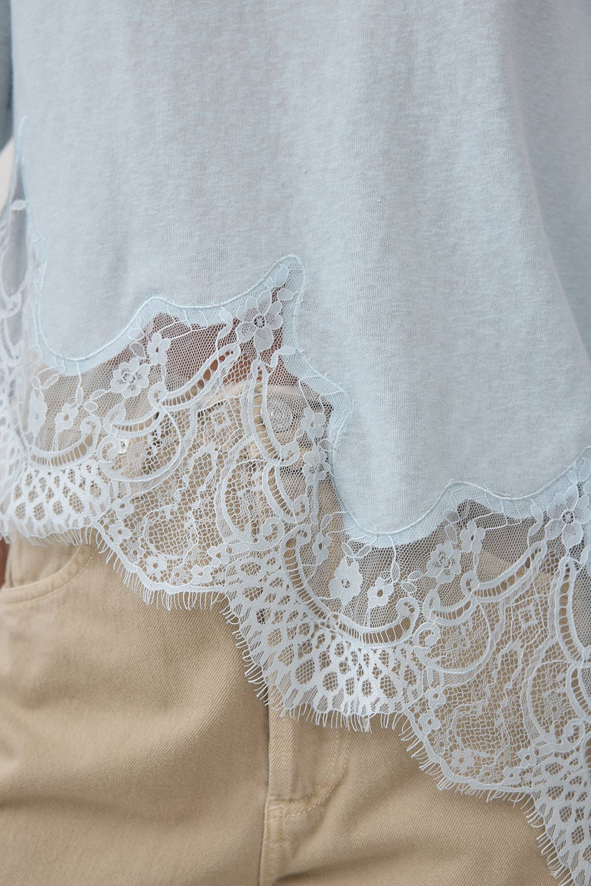 Light blue slub knit tee with lace hem