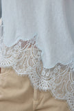 Light blue slub knit tee with lace hem